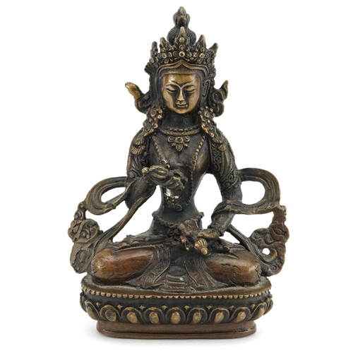 1352 - Chino Tibetan patinated bronze figure of seated Buddha, 12.5cm high