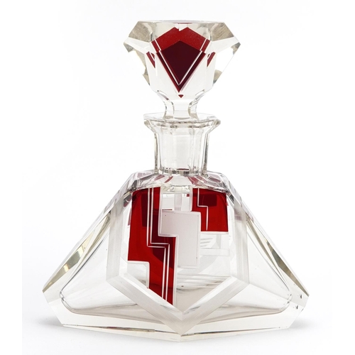 29 - Large Art Deco ruby flashed cut glass scent bottle having an etched geometric design, 19.5cm high