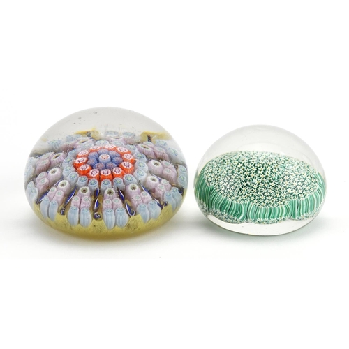 1357 - Two millefiori glass paperweights, the largest 6.5cm in diameter