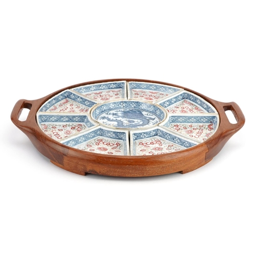 1306 - Chinese blue and white porcelain lazy Susan hand painted with a dragon housed in a hardwood tray, 34... 