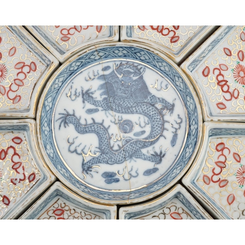 1306 - Chinese blue and white porcelain lazy Susan hand painted with a dragon housed in a hardwood tray, 34... 