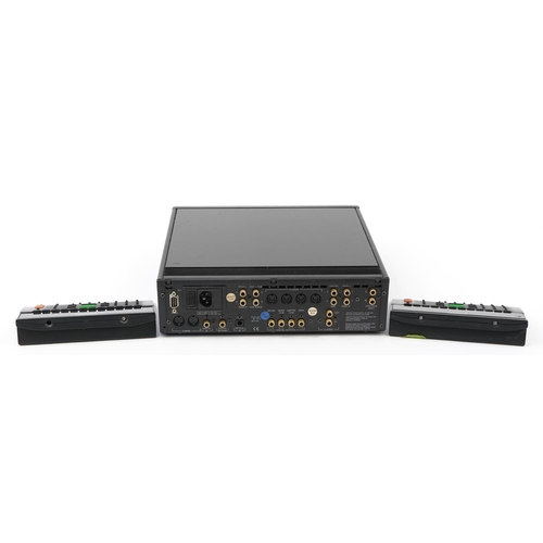 1532 - Meridian 565 digital surround processor and together with two remote controls and user guide