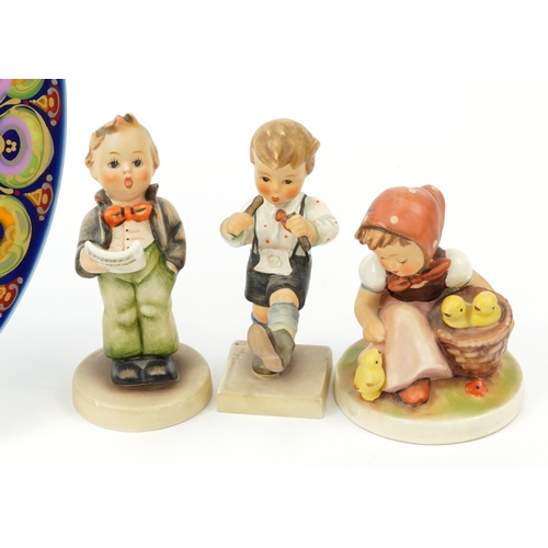 1307 - Two Goebel Hummel figures and a Rosenthal Galerie plate signed by Bjorn Wiinblad, the largest 29cm i... 