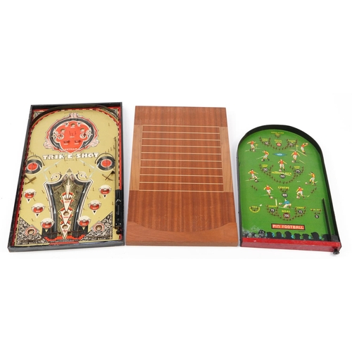 1688 - Two vintage bagatelle boards comprising Trik-E-Shot and Pin Football together with a shove halfpenny... 