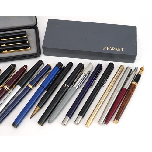 216 - Vintage and later pens and pencils including Parker