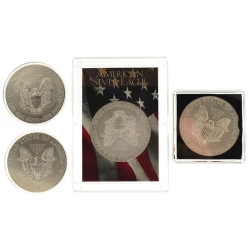 648 - Four United States of America one ounce fine silver Liberty dollars comprising dates 2008, 2013, 201... 