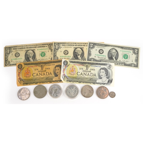 651 - American and Canadian coinage and banknotes, some silver including 1886 Morgan Dollar, 1922 Liberty ... 