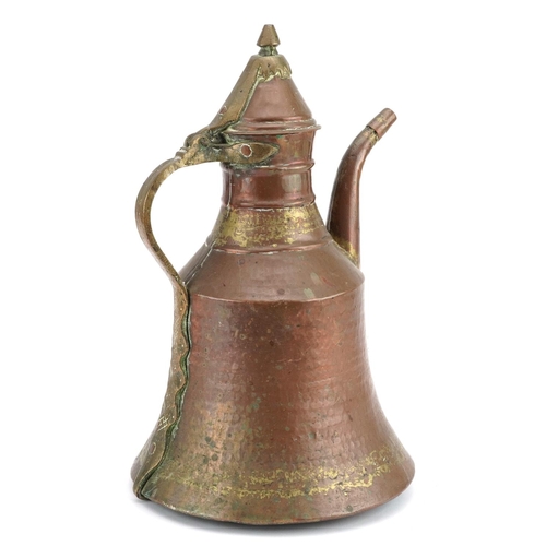 1383 - Omani copper and brass spouted vessel, 35cm high