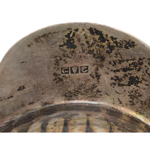 166 - Egyptian shell shaped silver dish raised on three feet, 12cm in length, 79.4g