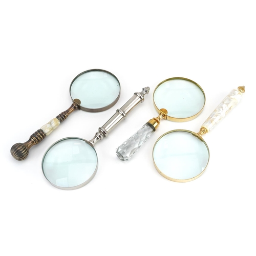 1308 - Four large magnifying glasses, two with mother of pearl handles, the largest 26cm in length