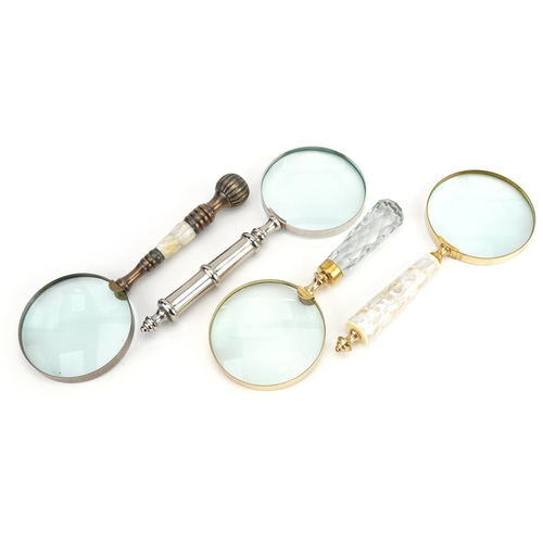 1308 - Four large magnifying glasses, two with mother of pearl handles, the largest 26cm in length