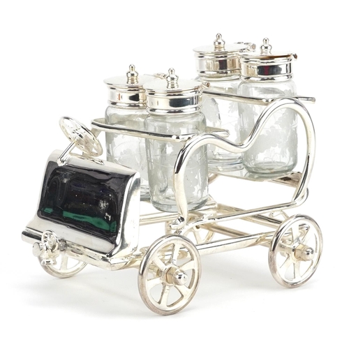 297 - Novelty silver plated four piece cruet in the form of a car, 15.5cm in length