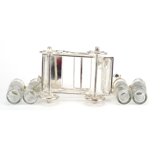 297 - Novelty silver plated four piece cruet in the form of a car, 15.5cm in length