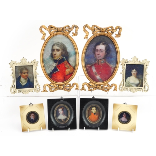 1304 - Four pairs of framed portrait miniatures including gentlemen in military dress, the largest overall ... 