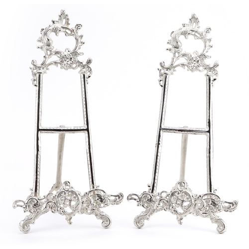 1287 - Pair of Rococo style silvered metal easel stands, each 41cm high