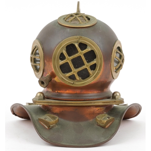 1283 - Miniature copper and brass model of a diver's helmet, 17.5cm high