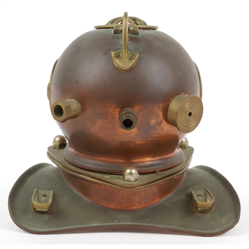 1283 - Miniature copper and brass model of a diver's helmet, 17.5cm high