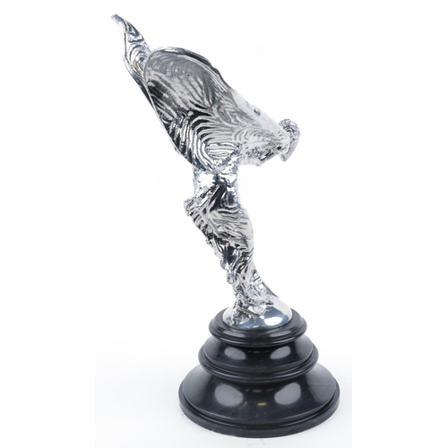 112 - Large floor standing silvered metal Spirit of Ecstasy raised on a circular black marble base, 64cm h... 