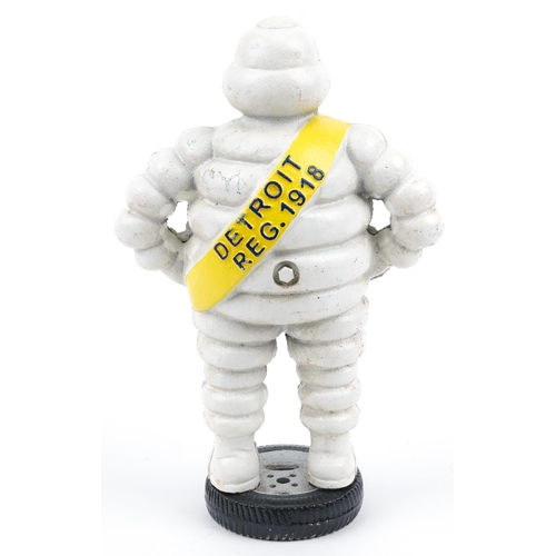 1309 - Michelin Tyres cast iron advertising figure, 38cm high