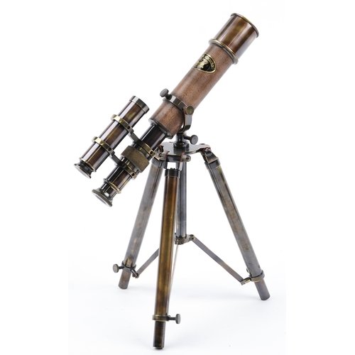 1366 - Brass table top telescope with tripod base, 26cm in length