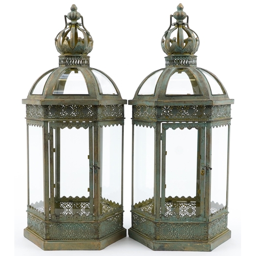 1344 - Pair of partially gilt metal and glass hexagonal hanging lanterns, 62cm high