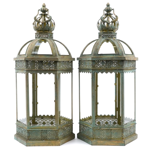 1344 - Pair of partially gilt metal and glass hexagonal hanging lanterns, 62cm high