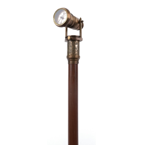 1380 - Hardwood walking stick with brass two draw telescope compass handle, 99cm in length