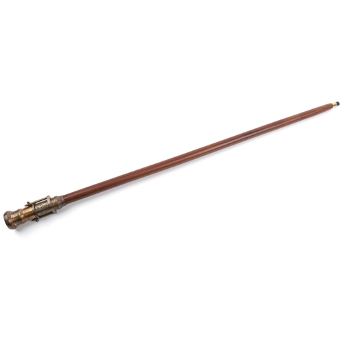 1380 - Hardwood walking stick with brass two draw telescope compass handle, 99cm in length