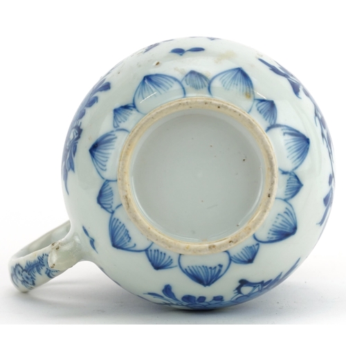 330 - Chinese blue and white porcelain handled cup hand painted with flowers, 11.5cm high