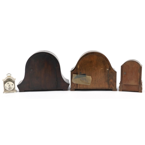 1321 - Three oak cased mantle clocks, one with Westminster chime and a Swiza carriage clock, the largest 28... 