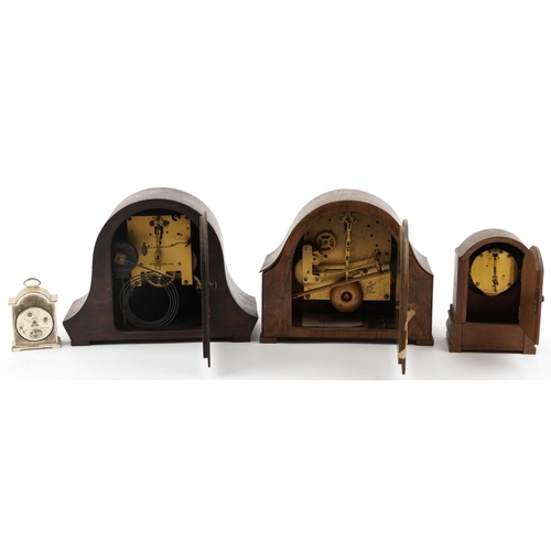 1321 - Three oak cased mantle clocks, one with Westminster chime and a Swiza carriage clock, the largest 28... 