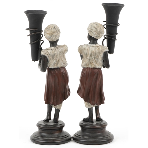 218 - Pair of Regency style cold painted bronze Blackamoor design vases, each 29cm high