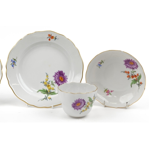 96 - Meissen, German porcelain hand painted with flowers comprising two cups with saucers and two side pl... 