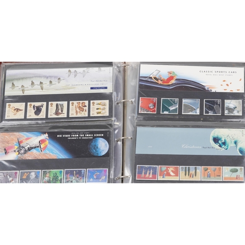 767 - Collection of Royal Mint presentation packs arranged in two albums, various genres and denominations