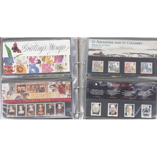 767 - Collection of Royal Mint presentation packs arranged in two albums, various genres and denominations