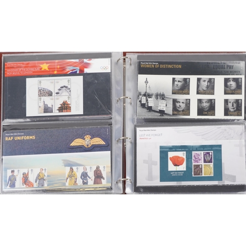 767 - Collection of Royal Mint presentation packs arranged in two albums, various genres and denominations