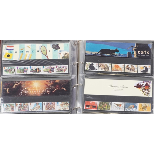 767 - Collection of Royal Mint presentation packs arranged in two albums, various genres and denominations