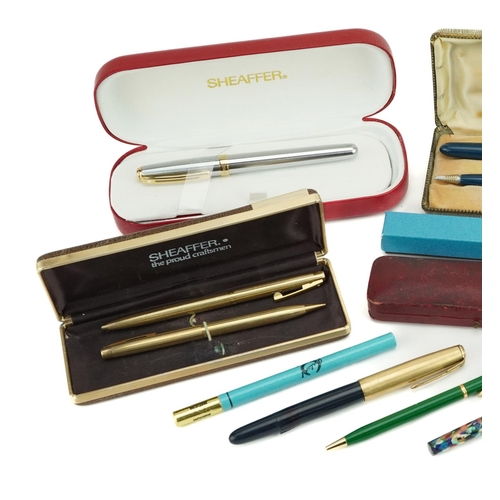 215 - Vintage and later pens including Parker 51 fountain pen and propelling pencil with case and Sheaffer