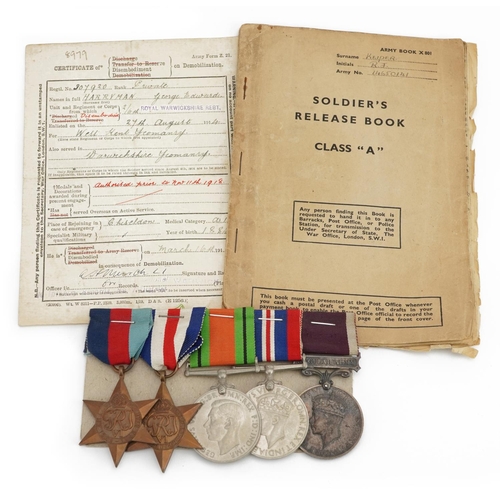 804 - British military World War II four medal group relating to George Edward Harryman of the Royal Worce... 