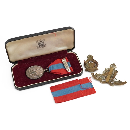 824 - Elizabeth II Faithful Service medal and two cap badges, the Faithful Service medal awarded to Willia... 