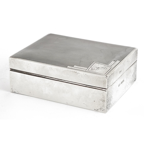 80 - Thomas William Lack, Art Deco silver cigarette box, the hinged lid with engine turned decoration, Lo... 