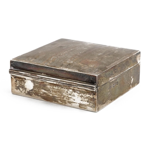 315 - E J Trevitt & Sons, Art Deco silver cigarette box, the hinged lid with engine turned decoration, Che... 