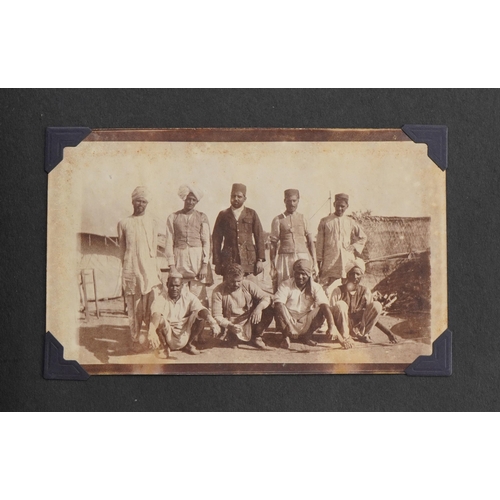 751 - Military interest black and white photographs of India arranged in an album including Ambola, temple... 