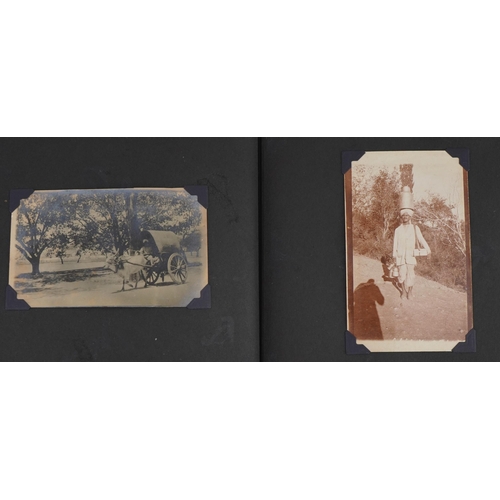 751 - Military interest black and white photographs of India arranged in an album including Ambola, temple... 