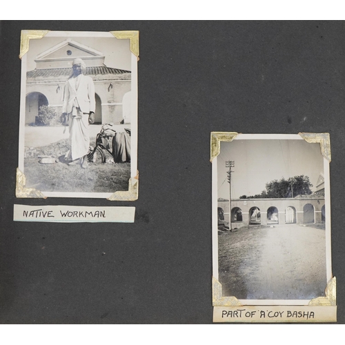 750 - Military interest black and white photographs of India arranged in an album including native workmen... 