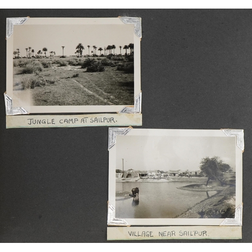 750 - Military interest black and white photographs of India arranged in an album including native workmen... 