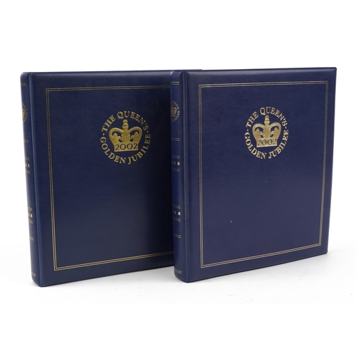 769 - The Queen's Golden Jubilee coin covers arranged in two albums including Isle of Man cover and Gibral... 