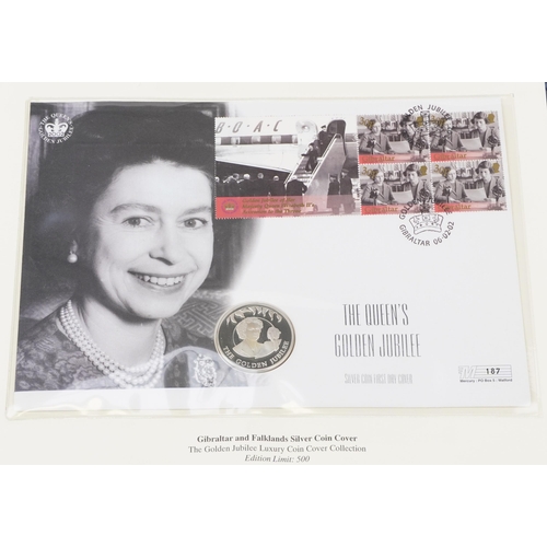 769 - The Queen's Golden Jubilee coin covers arranged in two albums including Isle of Man cover and Gibral... 