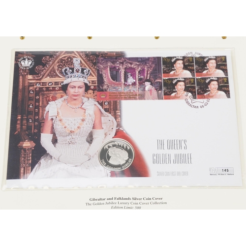 769 - The Queen's Golden Jubilee coin covers arranged in two albums including Isle of Man cover and Gibral... 