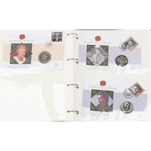 771 - The Queen's Golden Jubilee coin covers and stamps, some mint, arranged in two albums including Great... 